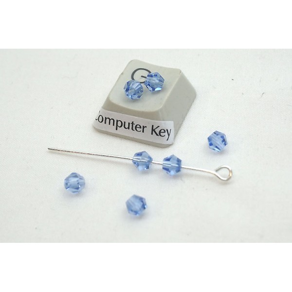 Glass beads, faceted, 4mm, light blue, bag 5 grams