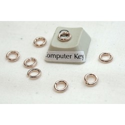 Jump rings, round, 6x0.9mm, rose gold plate, per 100