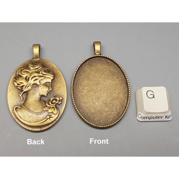 40x30mm Cabochon bezel setting, oval, antiqued bronze, lady cameo on back