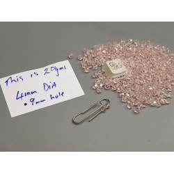Glass beads, faceted bicone, 4mm, pink colour, per 20g bag