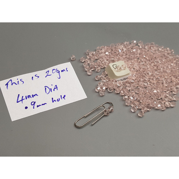Glass beads, faceted bicone, 4mm, pink colour, per 20g bag