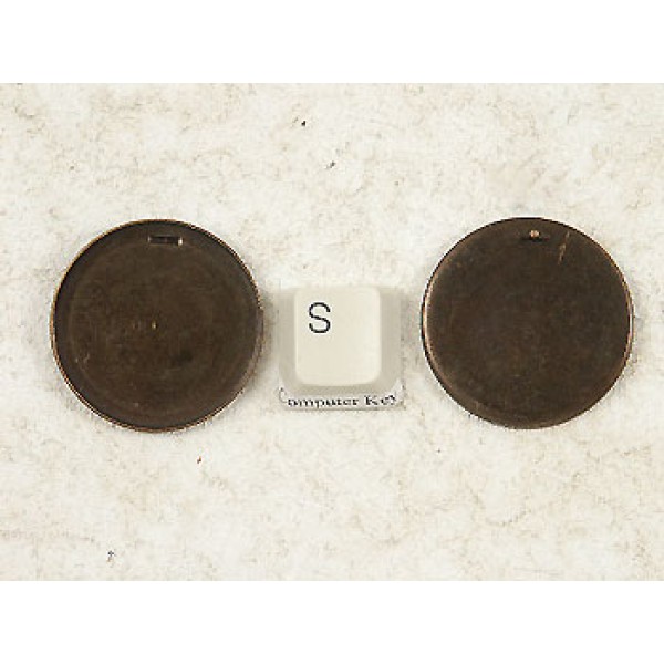 30mm plain round bezel setting, loop on back, antiqued brass