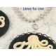 40x30mm Black with Ivory Octopus cameo (landscape view)