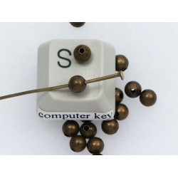 Filler Bead 4mm antique brass, seamless, per 50