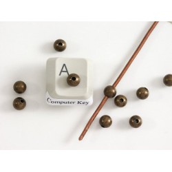 Filler Bead 5mm antique brass plated, seamless, per 50