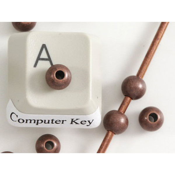 Filler Bead 5mm antique copper plated, seamless, per 50