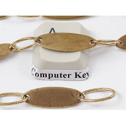 Chain by the metre, disc and ring, raw brass