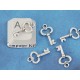 Mini Key charm, 15mm long, antiqued silver, bag of 50
