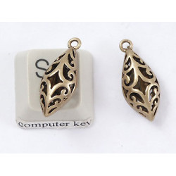 Drop pendant / charm with koru spirals, NF ant brass