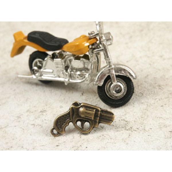 Charm, 38calibre special snub nose hand gun, ant brass