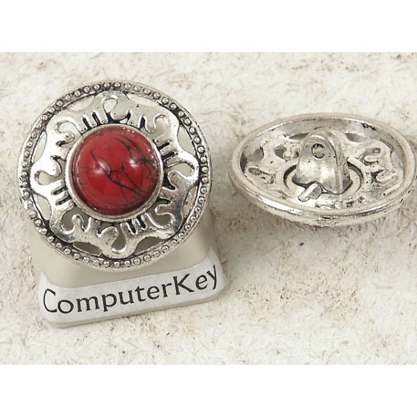 Button, round metal with red trim