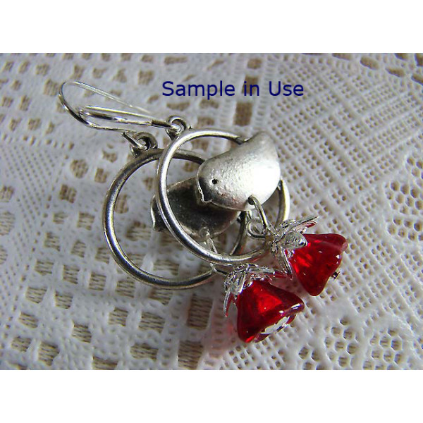 Bird in a Loop charm, ant. silver