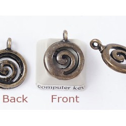 Charm, NZ Koru spiral, antiqued brass